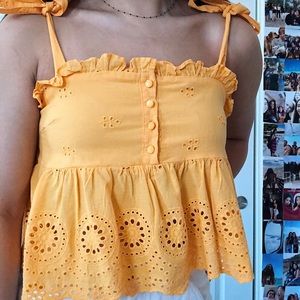 Urban outfitters: yellow eyelet top